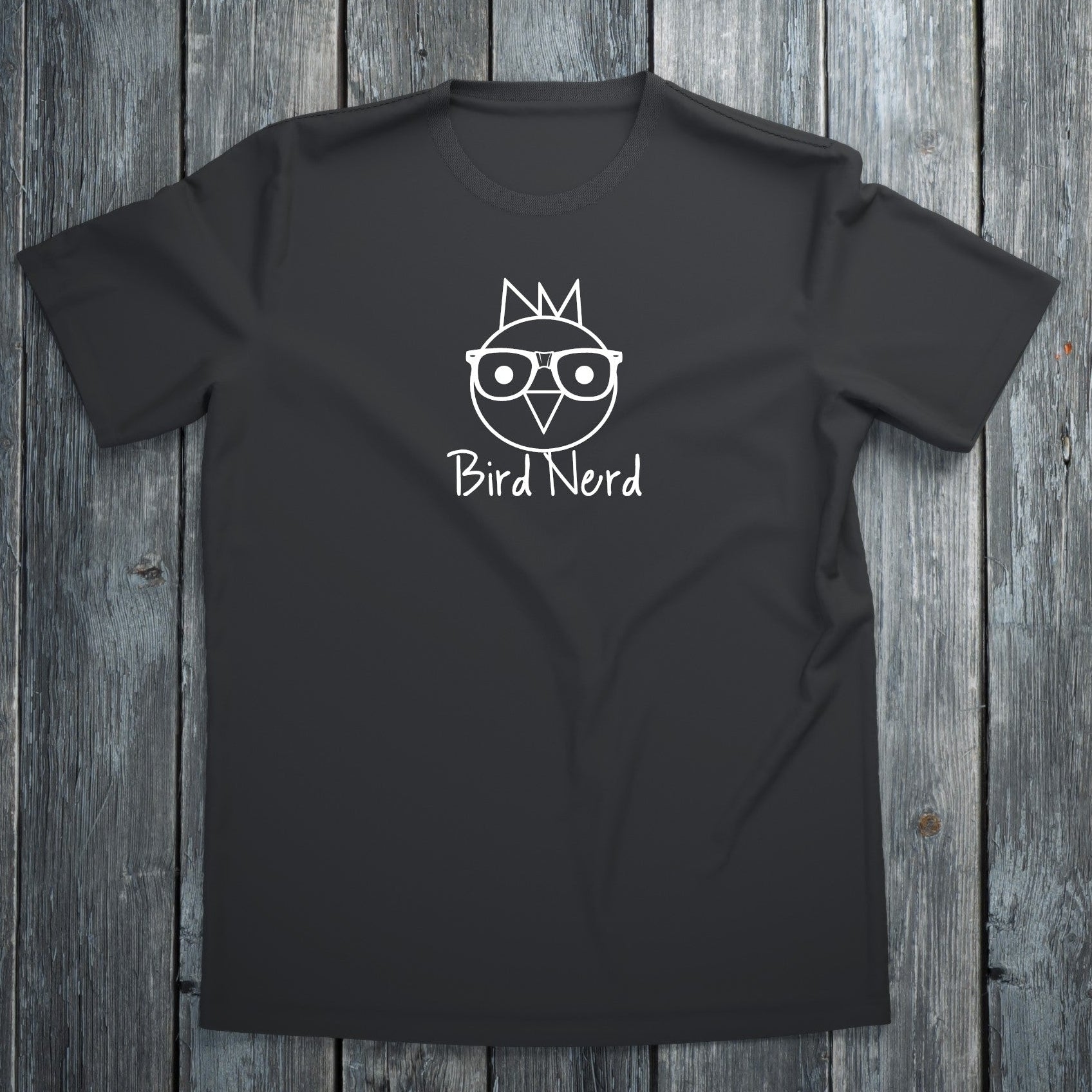 Black t-shirt with 'Bird Nerd' design on a wooden surface